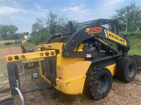 l228 skid steer loader with bale grapple|used l228 skid steer for sale.